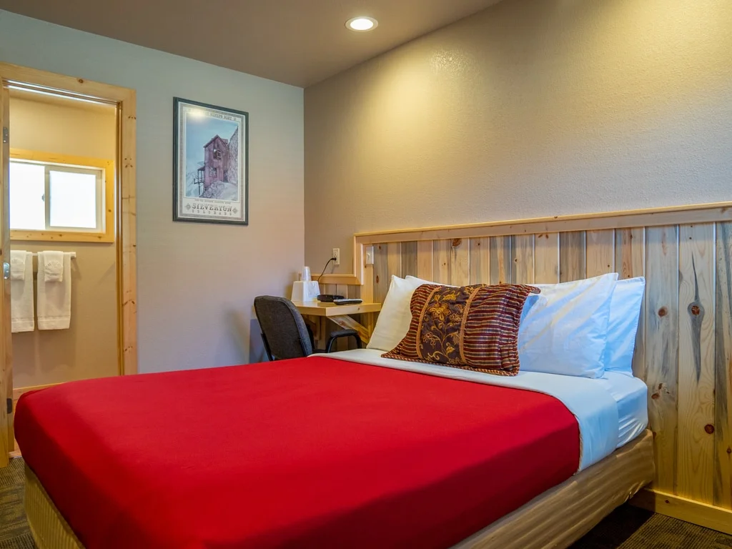 King bed room with mountain views